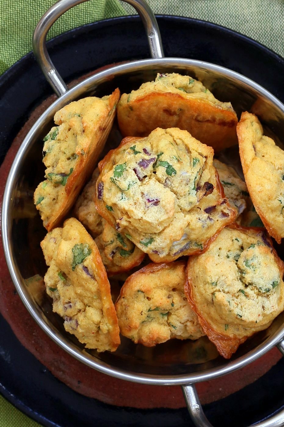 Mung Dal Fritters - Baked Moong Dal Pakoda. Petite yellow lentils (split and skinned mung beans) soaked and blended to a batter to make pakoda/Bhajji with onions and greens. Use red lentils or chickpea flour for variation. Vegan Gluten-free Recipe | VeganRicha.com