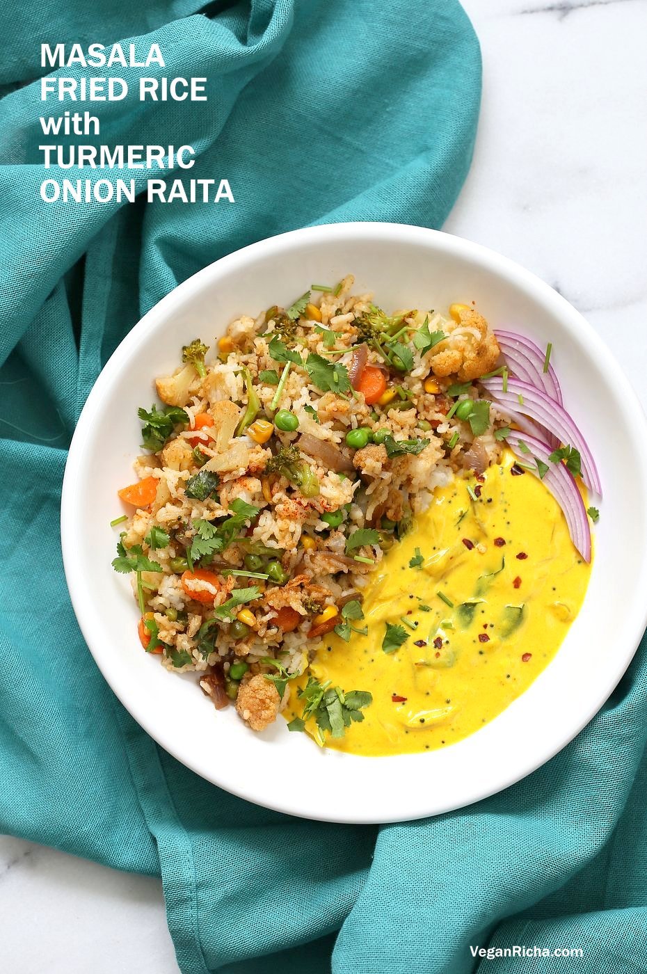 Indian Spiced Masala Fried Rice with Turmeric Onion Raita. Use up the leftover rice or grains to make this quick spiced fried rice and serve with a simple yogurt raita that is spiced with turmeric and mustard seeds. Vegan Gluten-free Soy-free Indian #veganricha #Recipe | VeganRicha.com