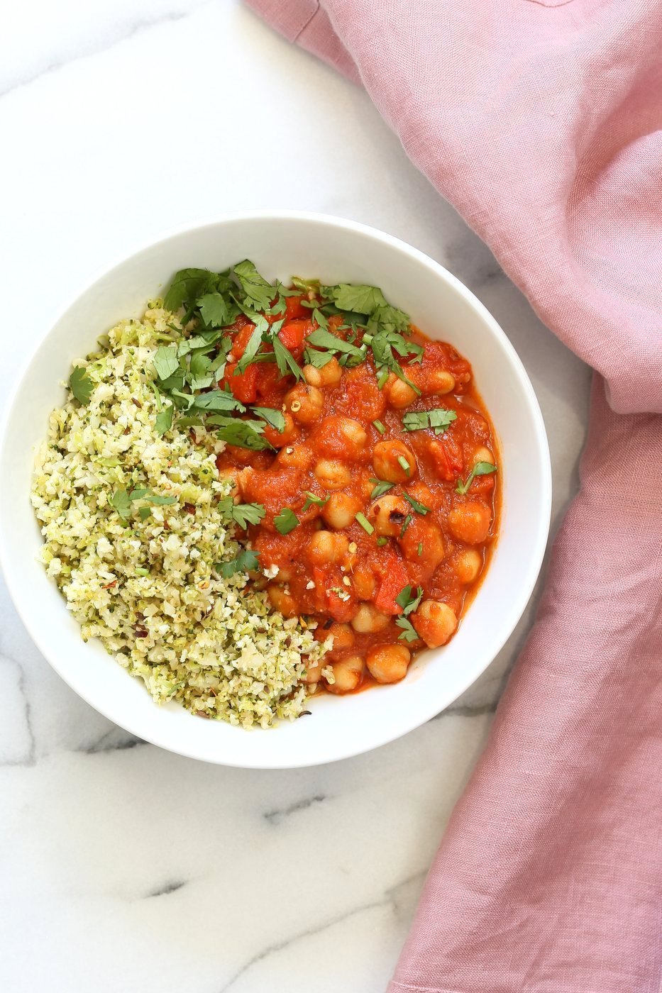 Flavorful Spanish Chickpea Stew with Cumin scented Cauliflower Broccoli Rice. Smoky tomatoey Chickpea Stew can be served over rice or grains or cauliflower or broccoli rice. Vegan Gluten-free Nut-free Grain-free Soy-free Recipe | VeganRicha.com