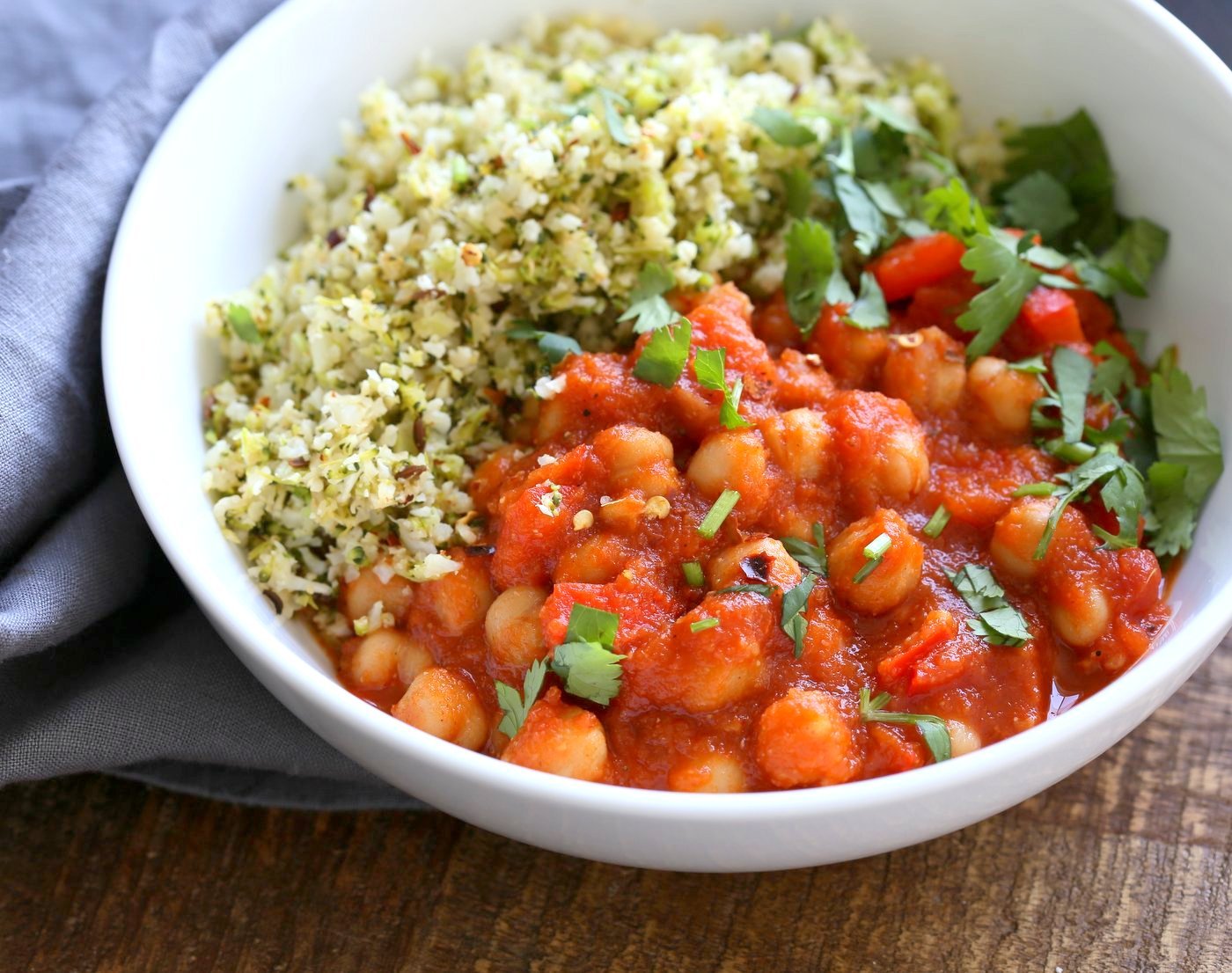 Flavorful Spanish Chickpea Stew with Cumin scented Cauliflower Broccoli Rice. Smoky tomatoey Chickpea Stew can be served over rice or grains or cauliflower or broccoli rice. Vegan Gluten-free Nut-free Grain-free Soy-free Recipe | VeganRicha.com