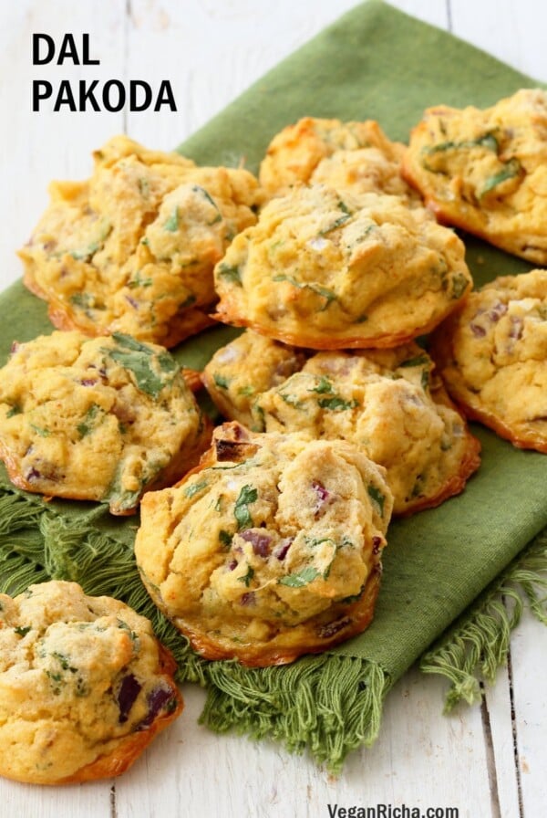 Mung Dal Fritters - Baked Moong Dal Pakoda. Petite yellow lentils (split and skinned mung beans) soaked and blended to a batter to make pakoda/Bhajji with onions and greens. Use red lentils or chickpea flour for variation. Vegan Gluten-free Recipe | VeganRicha.com
