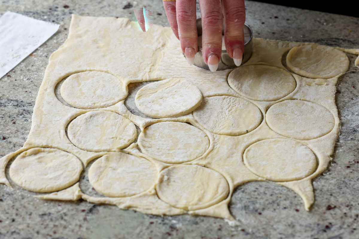 slicing the puff pastry into circles