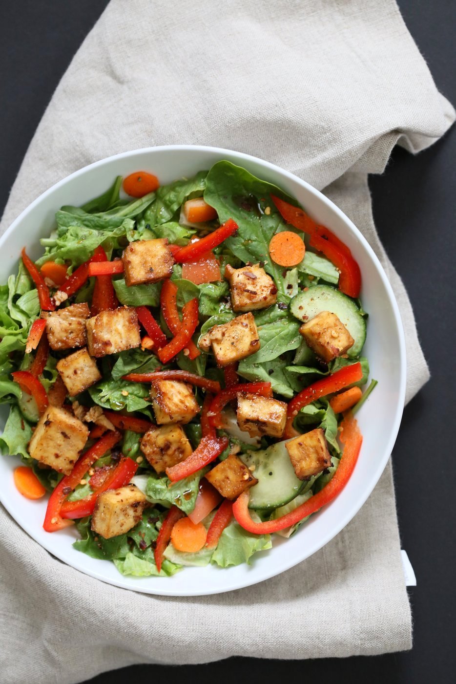 Crunchy Vegan Asian Salad With Baked Tofu & Garlic Soy Maple Dressing. Marinated and Baked Tofu over Crunchy Greens, peppers and carrots. Vegan Gluten-free Recipe | VeganRicha.com