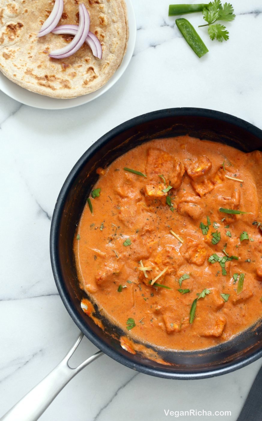 Restaurant Style Tofu Butter Masala Recipe - Indian Butter Tofu "Paneer". Dairy-free Tofu Paneer Butter Masala. Tofu is marinated and baked then simmered in tomato ginger cashew sauce. Vegan Gluten-free Recipe | VeganRicha.com