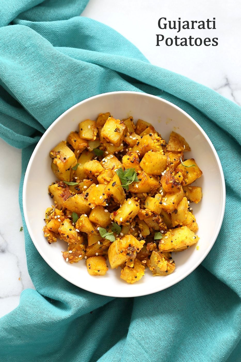 Gujarati Potatoes with Sesame Seeds. Indian Spiced Potatoes with sesame seed and peanuts. Vegan Gluten-free Soy-free Indian Gujarati Recipe. | VeganRicha.com