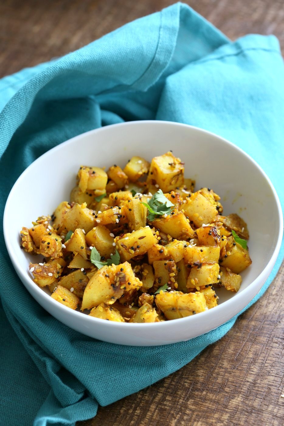 Gujarati Potatoes with Sesame Seeds. Indian Spiced Potatoes with sesame seed and peanuts. Vegan Gluten-free Soy-free Indian Gujarati Recipe. | VeganRicha.com