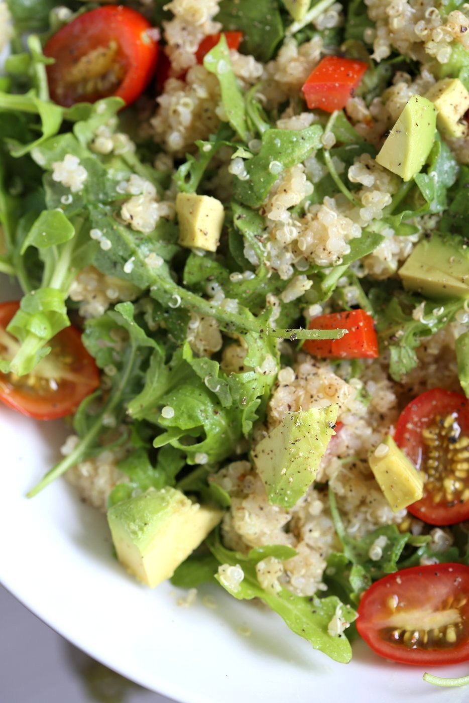 Mediterranean Quinoa Salad with Arugula, Avocado and Lemon Oregano Olive oil dressing. The Mediterranean Lemon Oregano Dressing brightens up this Summery Quinoa Salad. Perfect to make ahead and serve at Picnics. Vegan Gluten-free, Nut-free Soy-free Recipe | VeganRicha.com