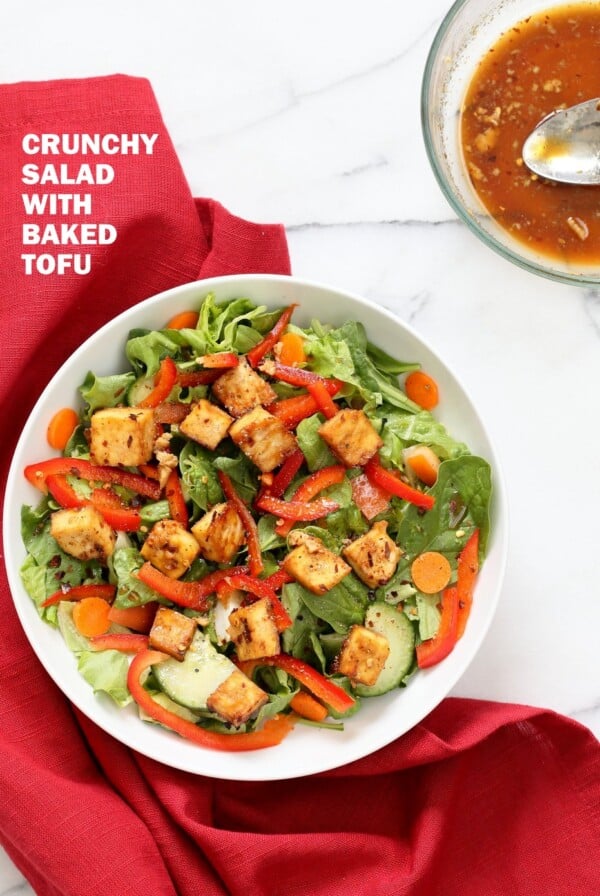 Crunchy Asian Salad With Baked Tofu & Garlic Soy Maple Dressing. Marinated and Baked Tofu over Crunchy Greens, peppers and carrots. Vegan Gluten-free Recipe | VeganRicha.com #glutenfree #veganricha #vegan