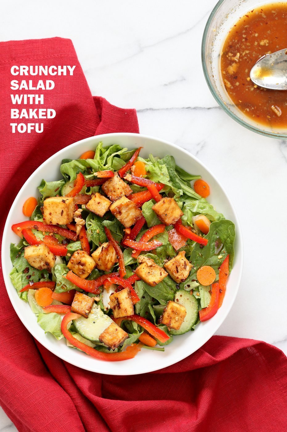 Crunchy Asian Salad With Baked Tofu & Garlic Soy Maple Dressing. Marinated and Baked Tofu over Crunchy Greens, peppers and carrots. Vegan Gluten-free Recipe | VeganRicha.com