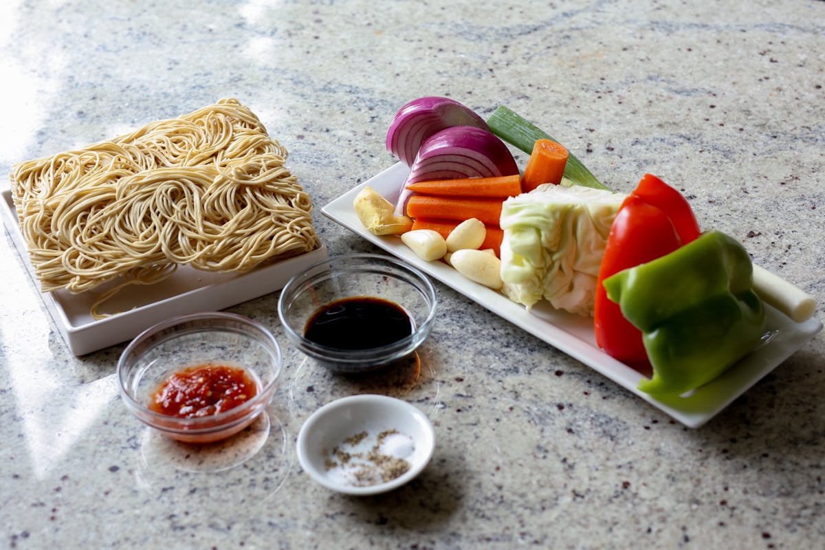 Hakka noodles ingredients on the kitchen counter