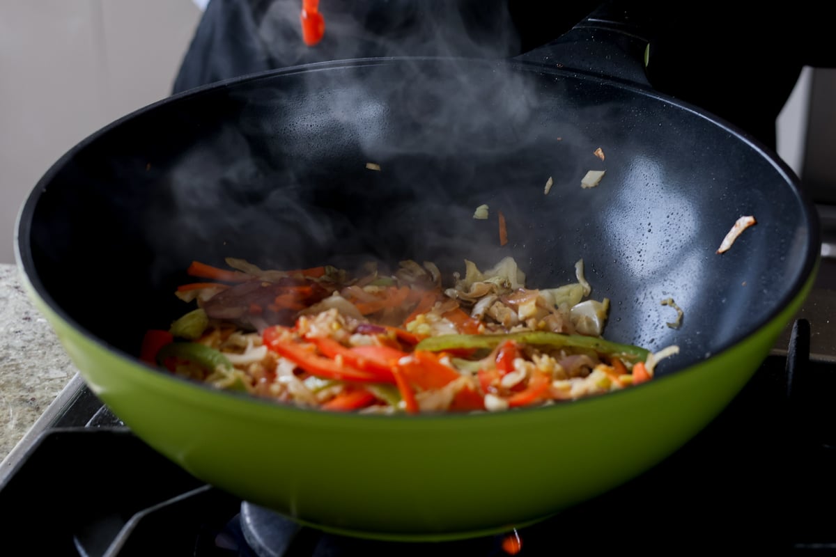 adding sauces to the pan