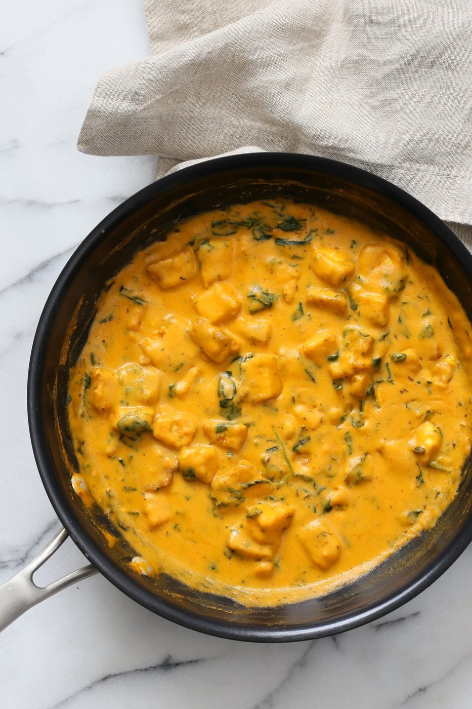 Methi Malai Paneer made vegan with Tofu and cashews. Easy Weeknight Restaurant style Indian main. Serve over Naan or rice. Vegan Gluten-free Recipe. Soy-free option | VeganRicha.com