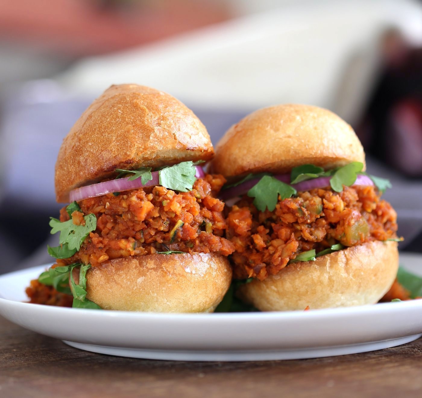 Smoky Vegan Sloppy Joes with Cajun Spices. Easy Red Lentil Carrot Zucchini Sloppy mix. Serve between soft buns, dinner rolls, pita pockets or tacos. Vegan Nut-free Recipe. Soy free option. Easily Gluten-free. | VeganRicha.com