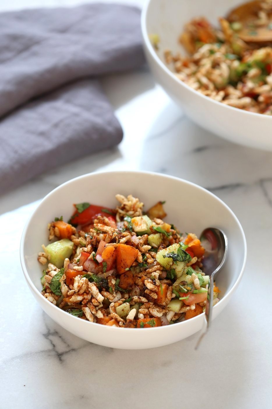 Sweet Potato Bhel Recipe - Indian Street Food style Snack Salad with Mint and Tamarind Chutney. Puffed Rice tossed with cooked sweet potato, nuts, onion, cucumber and tomato and dressed in chopped mint and 5 minute Tamarind Chutney. Vegan Bhel Puri Recipe. Can be glutenfree and nutfree. | VeganRicha.com