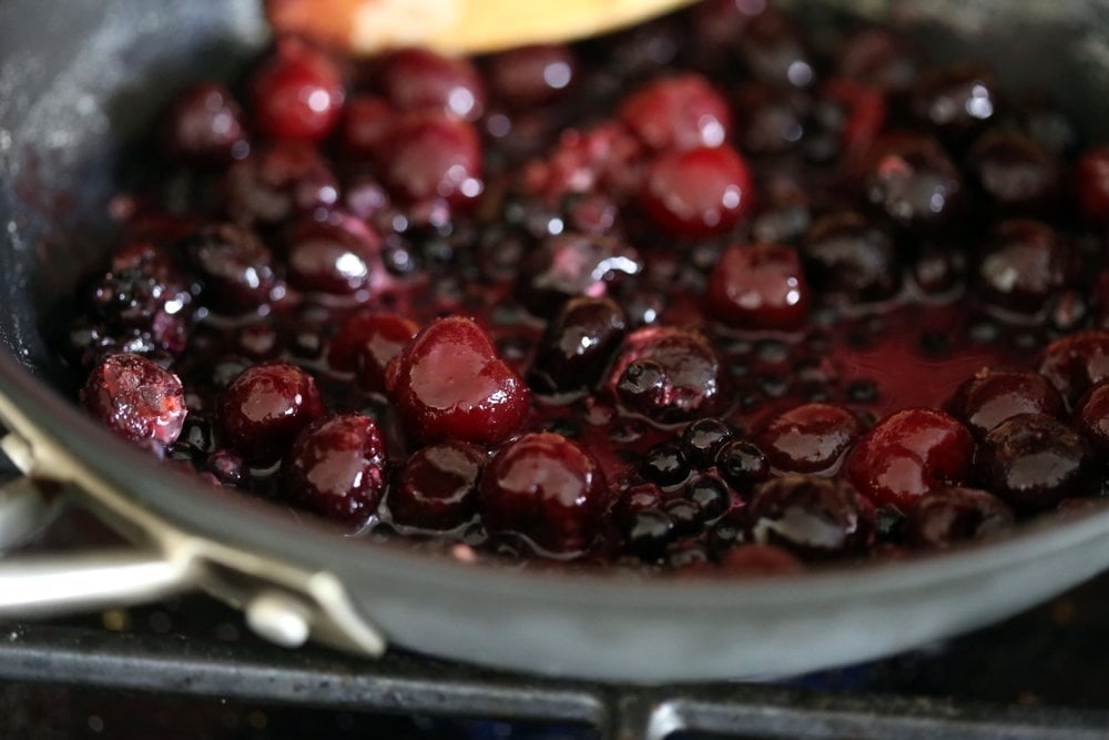 Easy 1 Pot No Bake Cherry Blueberry Crisp. Seasonal Berries cooked to a compote and topped with Toasted Crisp Oat crumble. Serve with favorite ice cream. Vegan Recipe. Can be gluten-free, nut-free | VeganRicha.com