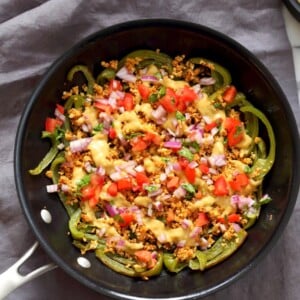 Vegan Bell Pepper Nachos with Cauliflower Taco Meat & 10 minute Vegan Nacho Cheese Sauce. Veggie full Nachos! Vegan Gluten-free Grain-free Soy-free Nut-free Recipe | VeganRicha.com
