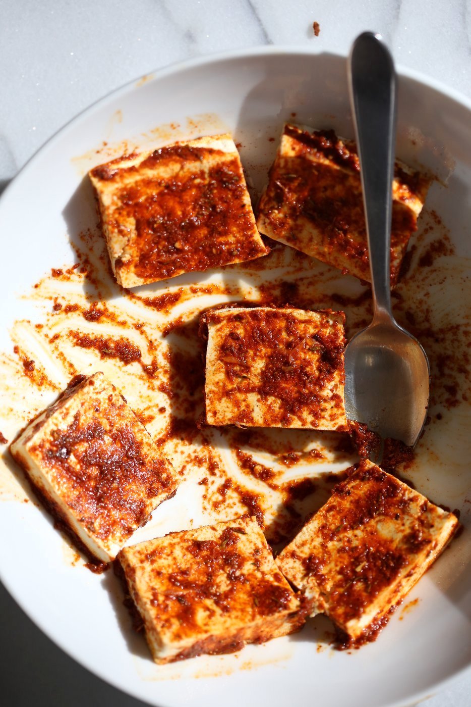 Cajun Tofu with Cilantro Lime Rice. Baked Cajun Spiced Tofu, over greens, cilantro lime rice, and tomatoes. Easy Spicy Bowl. Vegan Gluten-free Nut-free Recipe. Use Chickpea tofu to make soy-free. | VeganRicha.com