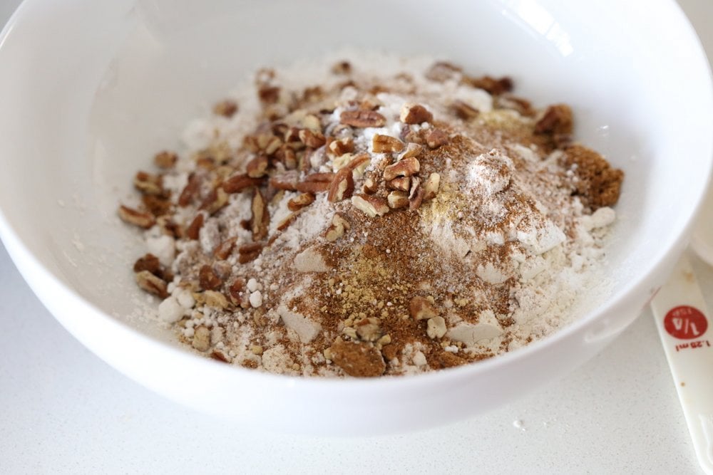 Vegan Pumpkin Coffee Cake with Pecan Crumb. Easy 1 Bowl Pumpkin Cake, topped with Chai Spice Pecan Streusel. Just 15 mins prep. Soft, Spiced, Delicious. Vegan Soy-free Recipe.  | VeganRicha.com