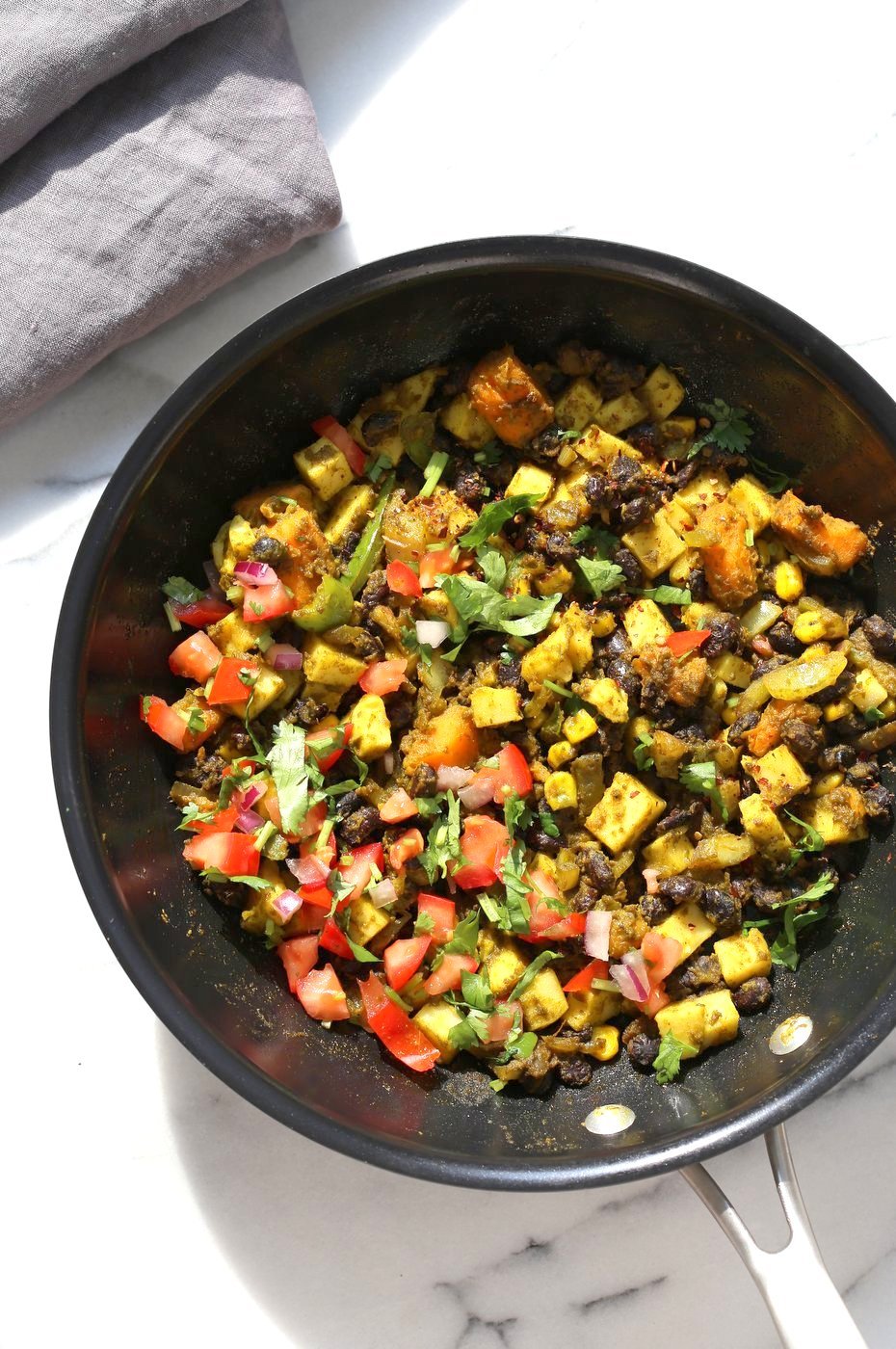Southwestern Tofu Scramble with Chickpea Tofu. Scrambled Tofu without Soy tofu! Soy-free Breakfast Scramble with Black beans, Veggies, Sweet Potatoes, Spices, Chickpea flour Tofu. Double Protein Savory Vegan Breakfast. Gluten-free Soy-free Nut-free  | VeganRicha.com