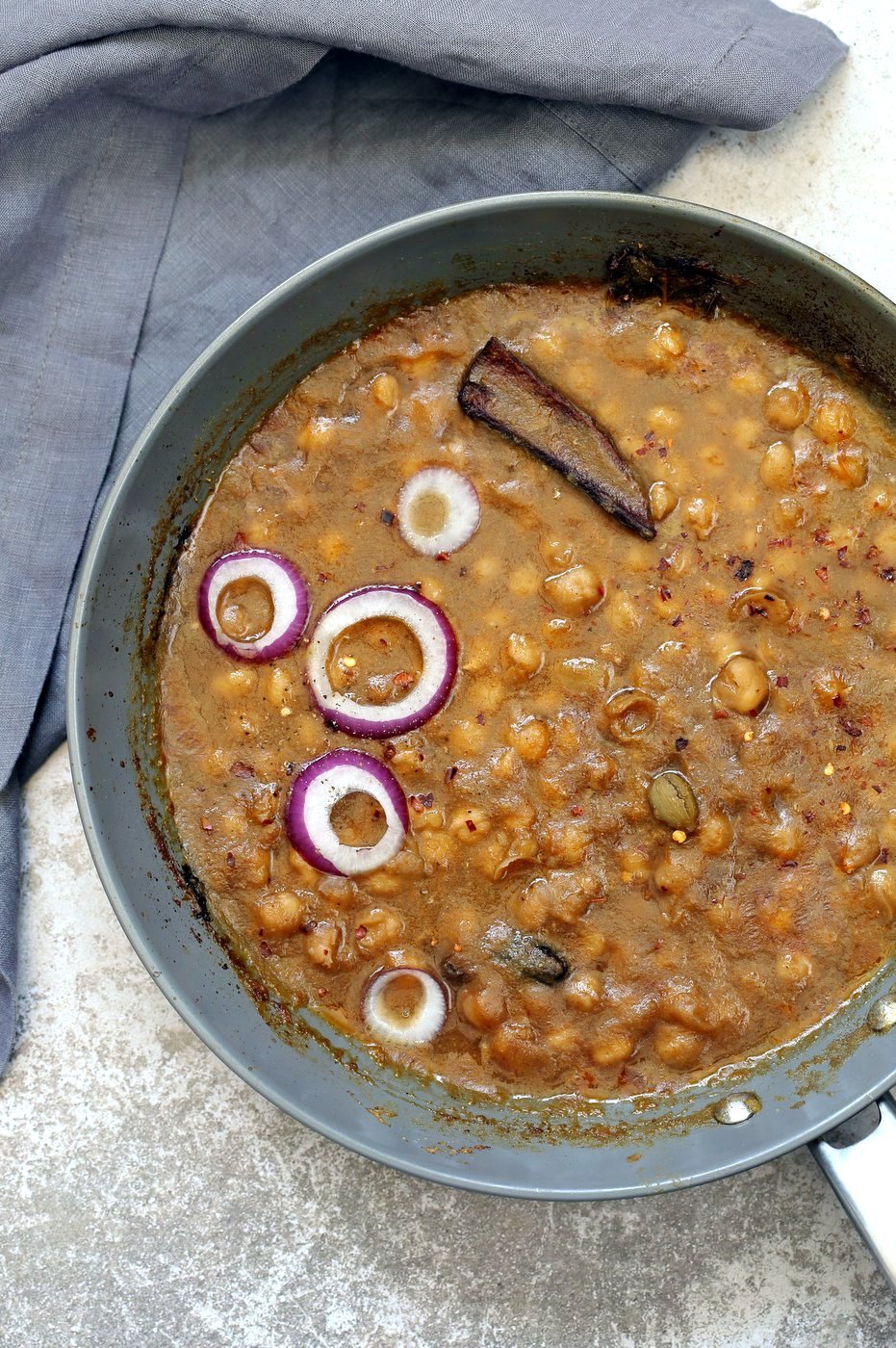 Pindi Chole - Chickpea Curry with Whole Spices. Chickpeas cooked with whole spices then added to a sauce with caramelized onions. Punjabi Chole Adapted from Rawalpindi style Chole. Vegan Gluten-free Nut-free Soy-free Recipe | VeganRicha.com