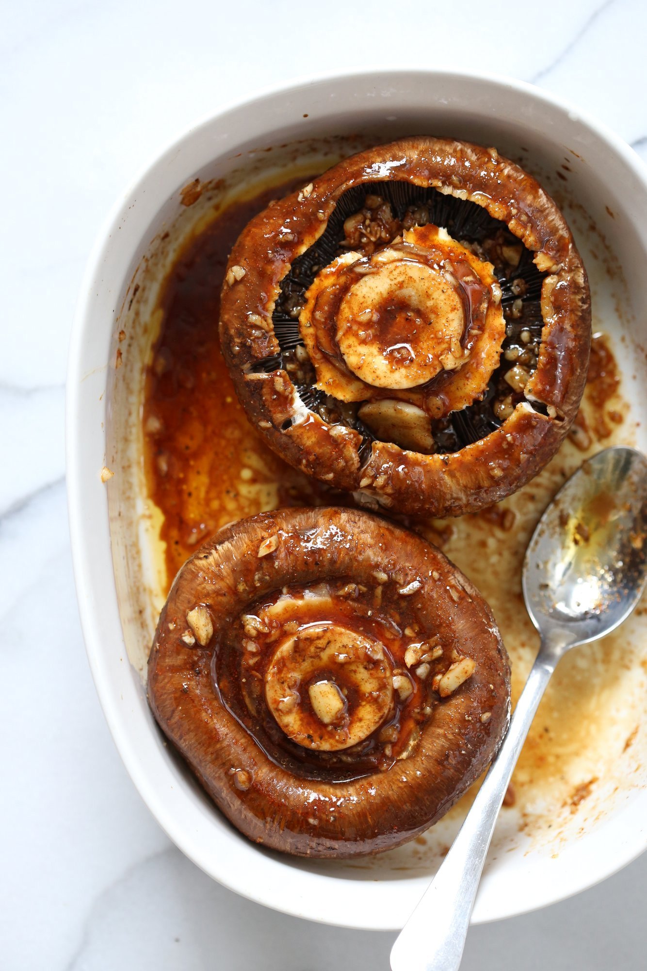 Grilled Portobello Mushrooms with Garlic Sauce. Grilled or Baked Marinated Portabella Mushrooms served with creamy gravy. #Vegan #Glutenfree #Recipe #veganricha | VeganRicha.com