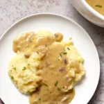vegan gravy on top of mashed potatoes