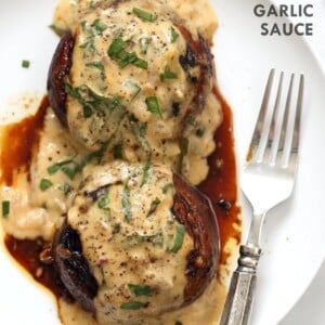 Grilled Portobello Mushrooms with Garlic Sauce. Grilled or Baked Marinated Portabella Mushrooms served with creamy gravy. #Vegan #Glutenfree #Recipe #veganricha | VeganRicha.com