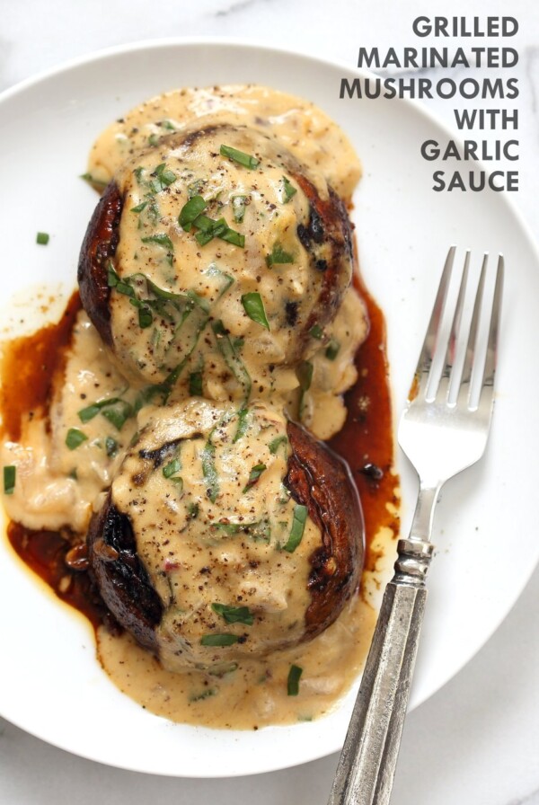 Grilled Portobello Mushrooms with Garlic Sauce. Grilled or Baked Marinated Portabella Mushrooms served with creamy gravy. #Vegan #Glutenfree #Recipe #veganricha | VeganRicha.com