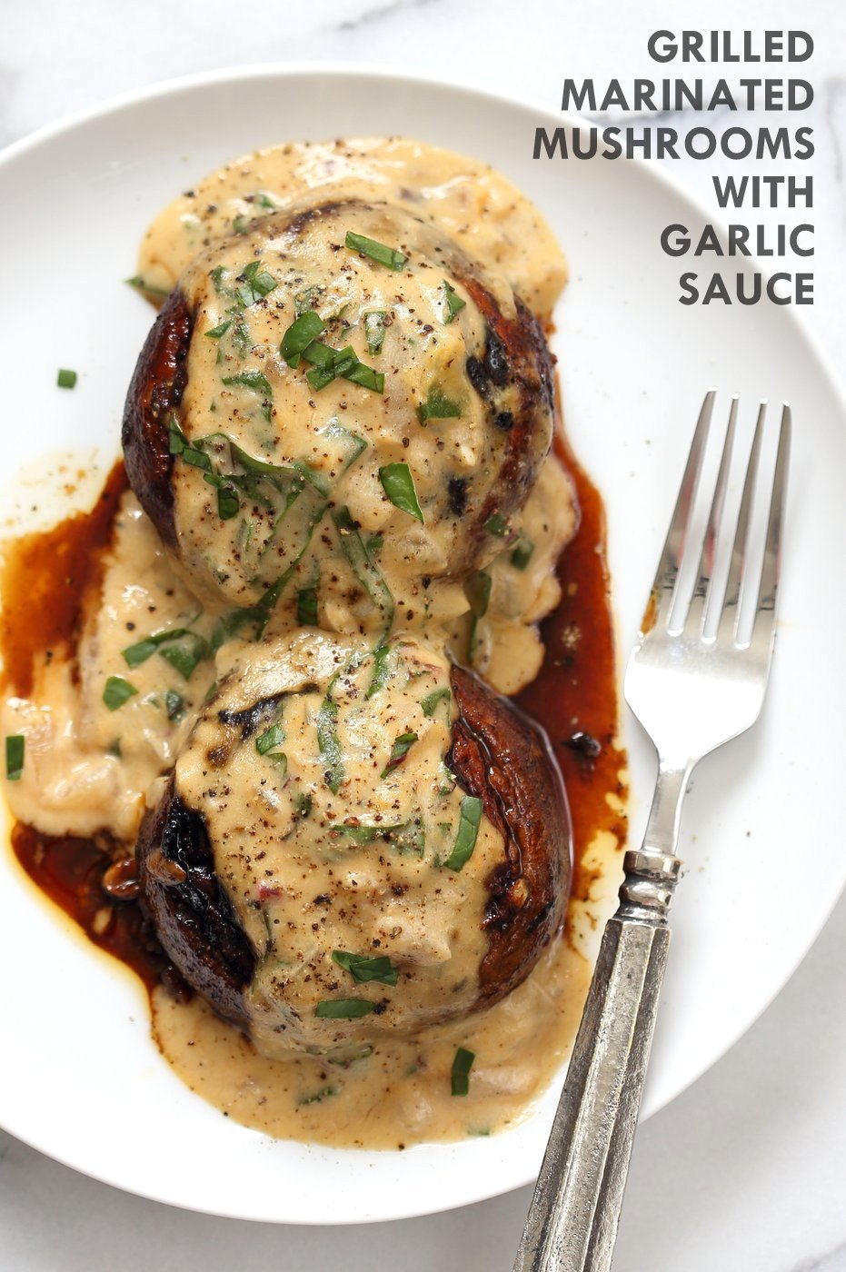 Grilled Portobello Mushrooms with Garlic Sauce. Grilled or Baked Marinated Portabella Mushrooms served with creamy gravy. #Vegan #Glutenfree #Recipe #veganricha | VeganRicha.com