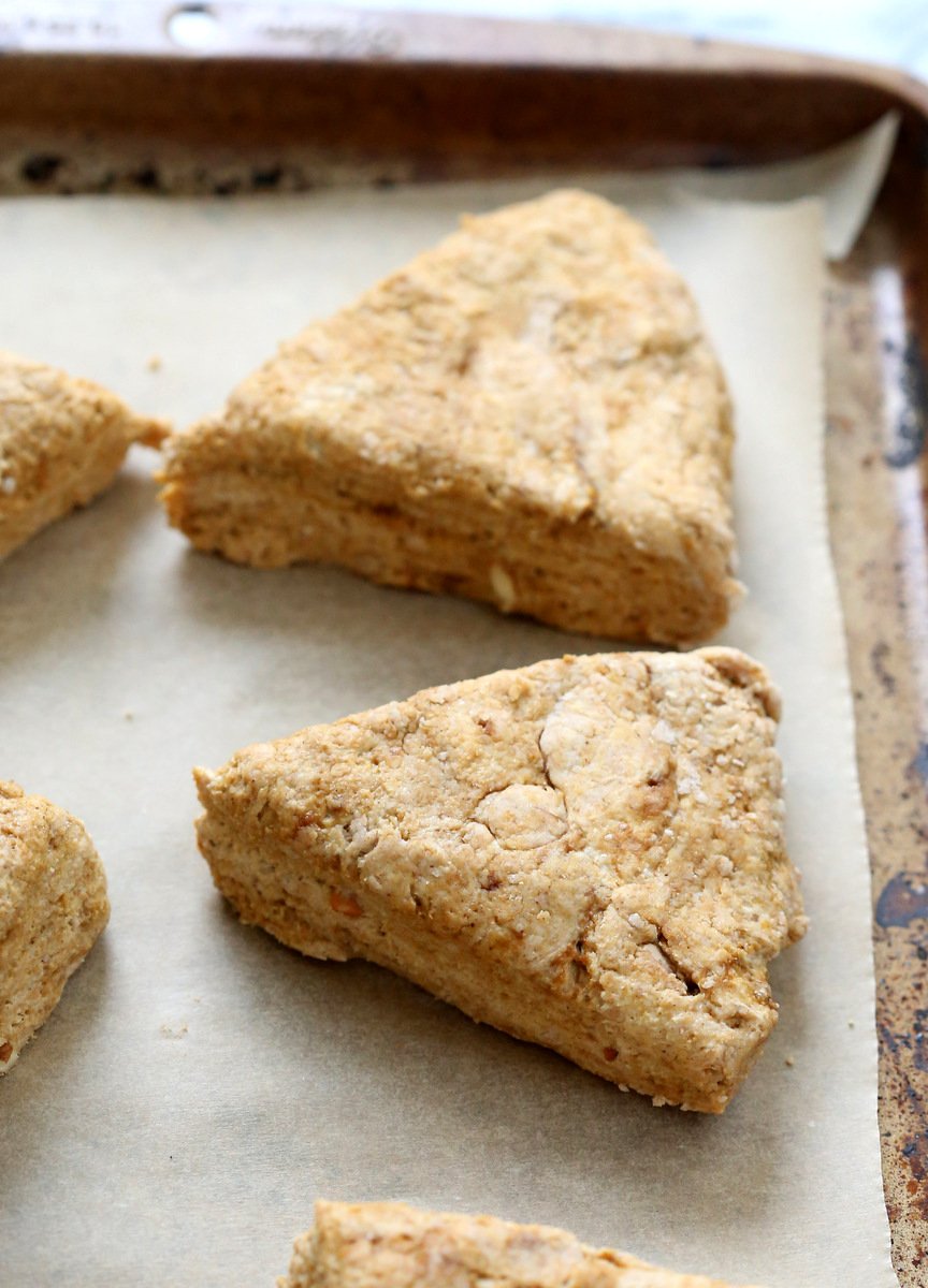 Vegan Pumpkin Scones with Spiced Pumpkin Caramel Glaze Oil-free. These Easy Scones use coconut cream instead of oil and make for a great breakfast with the pumpkin glaze. #Vegan #Recipe #veganricha | VeganRicha.com