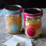 jars of khichdi mix with the spice pouch next to them