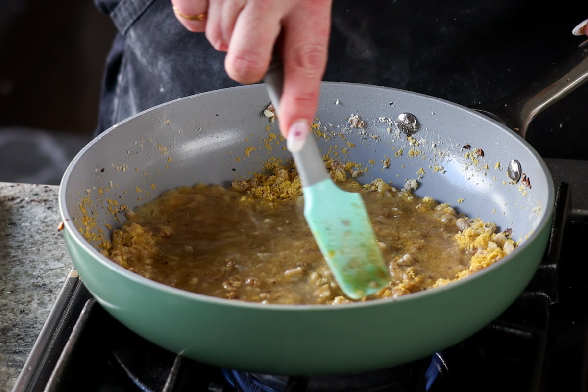 pressing out lumps in the gravy