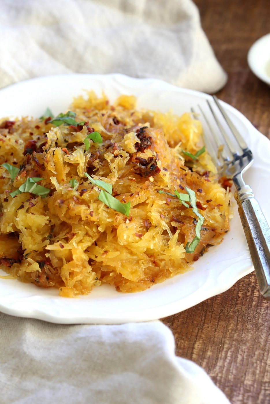 Spaghetti Squash Pasta with Sundried Tomato, Garlic & Basil. Light Dinner with no Grains. Add some spiced chickpeas or baked tofu for variation. #Vegan #Glutenfree Soy-free #Recipe #veganricha | VeganRicha.com