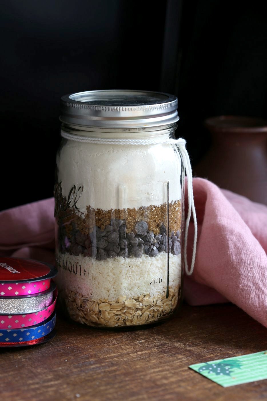 Vegan Cowboy Cookies Mix makes great Jar gifts for the Holiday Season. Layer oats, flour, coconut, chocolate sugar and pecans. Mix, add applesauce and oil, and bake. #veganricha #Vegan #Recipe Can be #glutenfree. | VeganRicha.com
