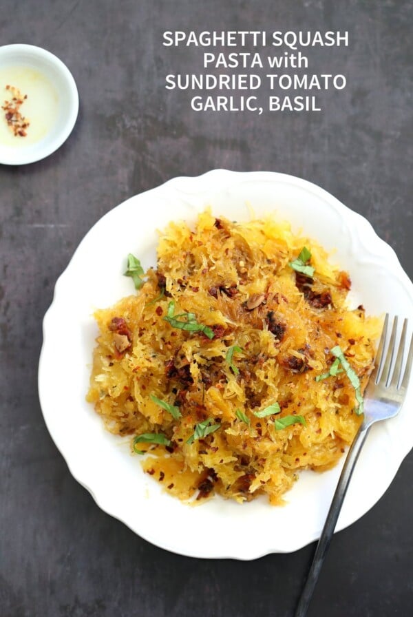 Spaghetti Squash Pasta with Sundried Tomato, Garlic & Basil. Light Dinner with no Grains. Add some spiced chickpeas or baked tofu for variation. #Vegan #Glutenfree Soy-free #Recipe #veganricha | VeganRicha.com
