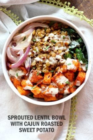 Spiced Sprouted Lentils, Cajun Roasted Sweet Potato Bowl with Veggies, Greens and Tahini Garlic Dressing. Vegan Gluten-free Soy-free Recipe.ย  #vegan #veganricha | VeganRicha.com