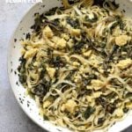 Fettuccine with Caramelized Onions, Greens and Vegan Feta - ish cheese. Easy Weeknight meal. Make the cheese ahead, then the dish is 1 Pot and 30 minutes. #Vegan, can be Gluten-free, Soy-free #veganricha | VeganRicha.com