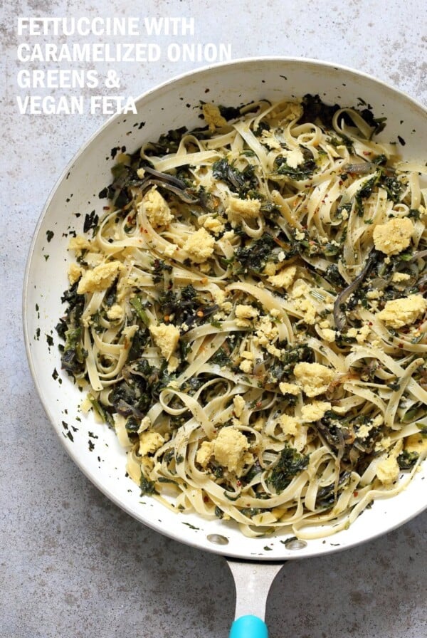 Fettuccine with Caramelized Onions, Greens and Vegan Feta - ish cheese. Easy Weeknight meal. Make the cheese ahead, then the dish is 1 Pot and 30 minutes. #Vegan, can be Gluten-free, Soy-free #veganricha | VeganRicha.com