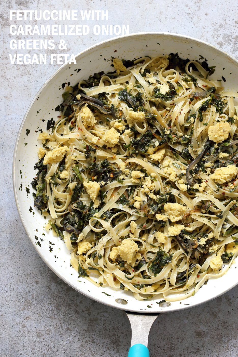 Fettuccine with Caramelized Onions, Greens and Vegan Feta - ish cheese. Easy Weeknight meal. No soaking, blending or straining needed for the cheese! Make the cheese ahead, then the pasta is 1 Pot and 30 minutes. #Vegan, can be Gluten-free, Soy-free #veganricha | VeganRicha.com