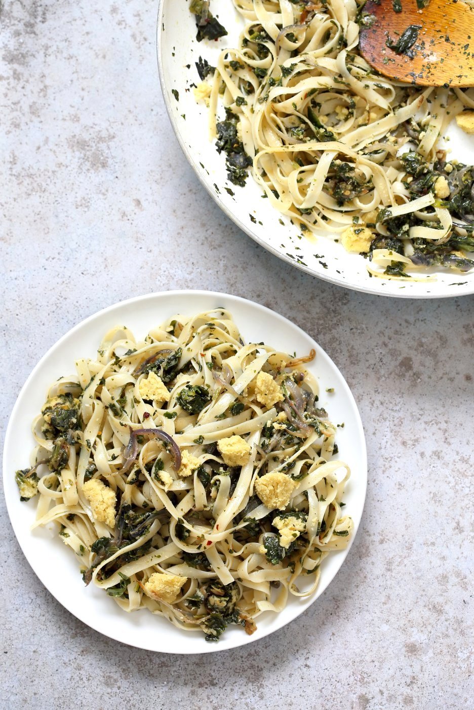 Fettuccine with Caramelized Onions, Greens and Vegan Feta - ish cheese. Easy Weeknight meal. Make the cheese ahead, then the dish is 1 Pot and 30 minutes. #Vegan, can be Gluten-free, Soy-free #veganricha | VeganRicha.com