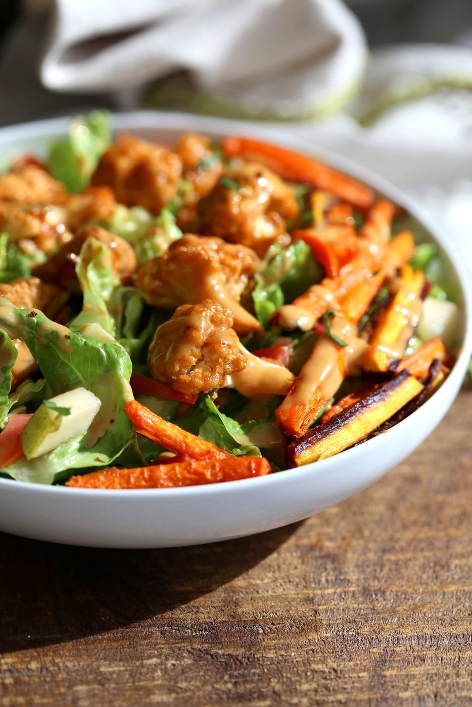 Peanut Butter Cauliflower Bowl with Roasted Carrots. Cauliflower tossed in peanut butter sauce and roasted, carrots tossed in hot sauce and roasted. Vegan Recipe, Gluten-free Recipe.  | VeganRicha.com