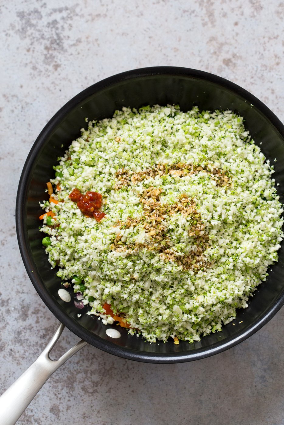 Cauliflower Fried Rice. Easy 1 Pot Fried Rice. No grains, low carb. So fluffy and so good. #Vegan #Glutenfree #Grainfree #Nutfree #Recipe #veganricha  | VeganRicha.com