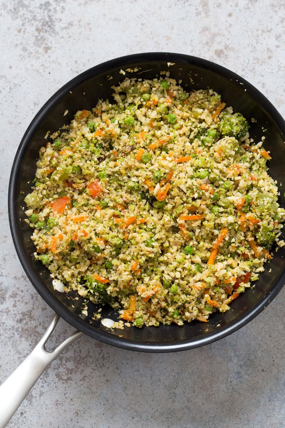 Cauliflower Fried Rice. Easy 1 Pot Fried Rice. No grains, low carb. So fluffy and so good. #Vegan #Glutenfree #Grainfree #Nutfree #Recipe #veganricha  | VeganRicha.com