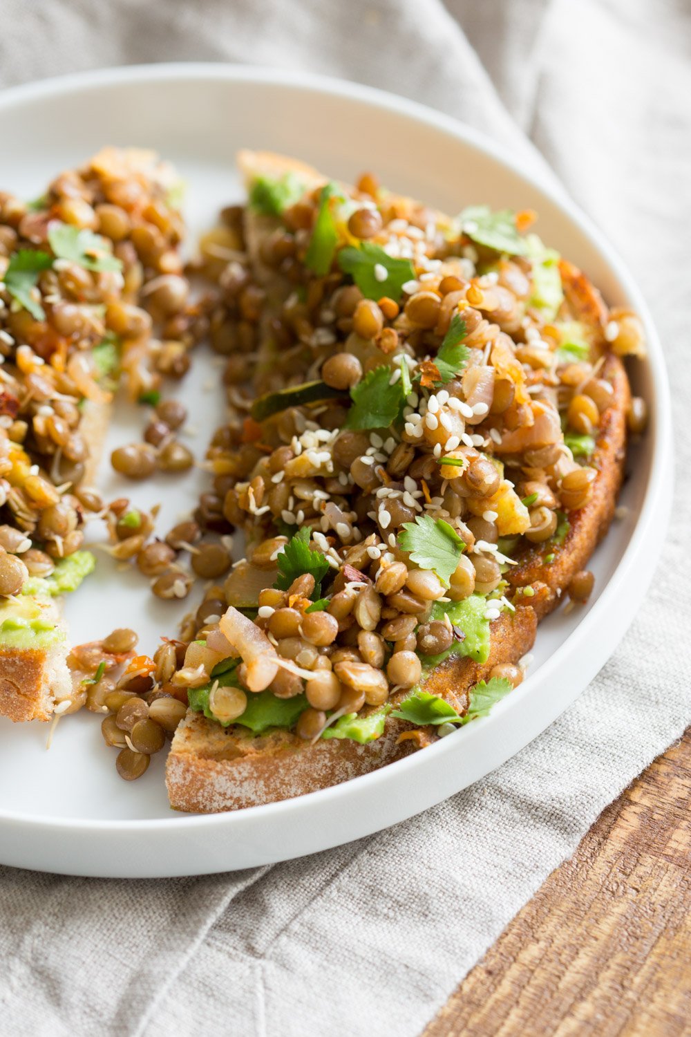 Ginger Coriander Sprouted Lentils Avocado Toast. Sprout Lentils or Mung Beans, Lightly saute with ginger, onion and tomato and serve over Mashed Avocado Toast. #Vegan #veganricha #Nutfree #Soyfree #Recipe | VeganRicha.com