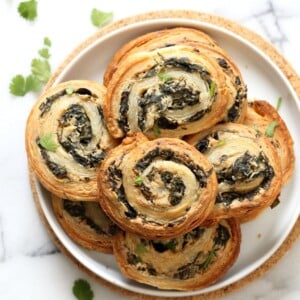 Vegan Spinach Pinwheels. Creamy cheesy Spinach dip spread on puff pastry, rolled, sliced and baked to make a great Snack. #Vegan #Soyfree #Recipe #veganricha | VeganRicha.com 
