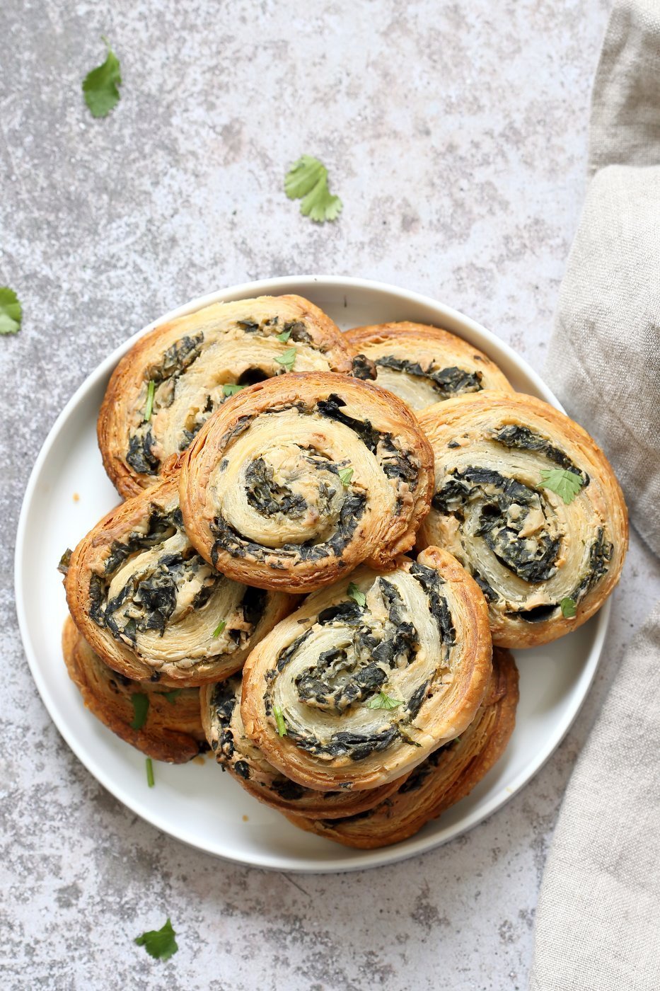 Vegan Spinach Pinwheels. Creamy cheesy Spinach dip spread on puff pastry, rolled, sliced and baked to make a great Snack. #Vegan #Soyfree #Recipe #veganricha | VeganRicha.com