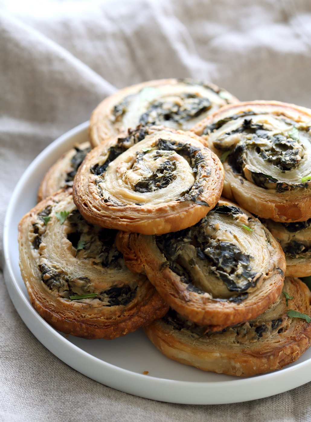 Vegan Spinach Pinwheels. Creamy cheesy Spinach dip spread on puff pastry, rolled, sliced and baked to make a great Snack. #Vegan #Soyfree #Recipe #veganricha | VeganRicha.com