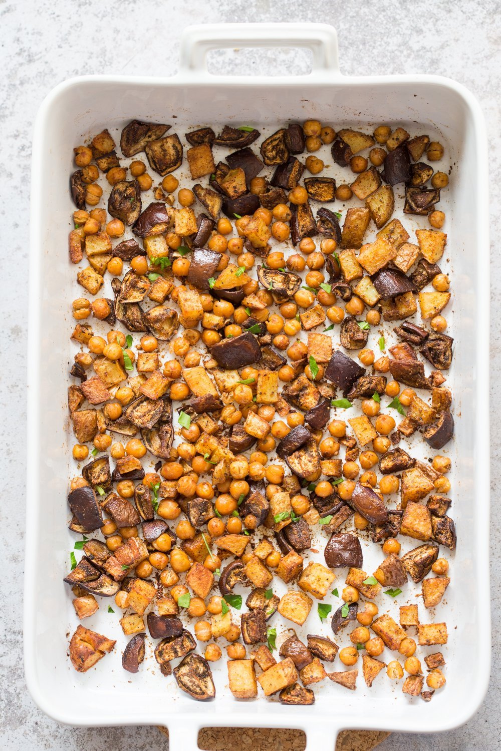 Roasted Eggplant Potatoes Chickpeas with Moroccan Merguez seasoning. Veggies tossed in Merguez blend, roasted then served with tahini dressing. #Vegan #Glutenfree #soyfree #Recipe #veganricha | VeganRicha.com
