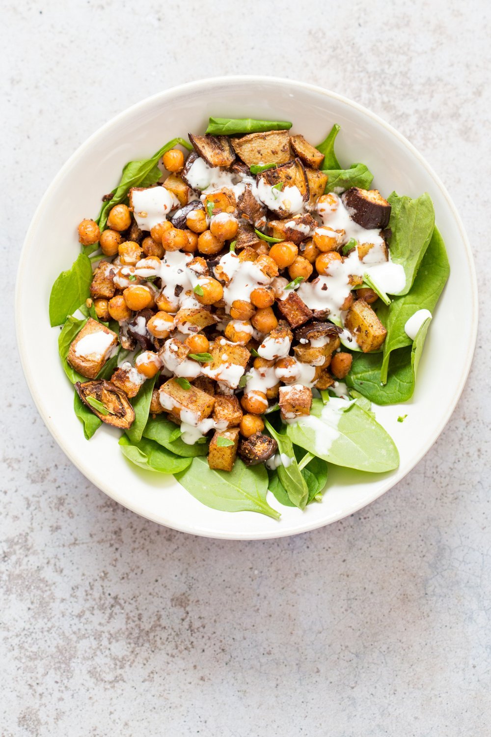 Roasted Eggplant Potatoes Chickpeas with Moroccan Merguez seasoning. Veggies tossed in Merguez blend, roasted then served with tahini dressing. #Vegan #Glutenfree #soyfree #Recipe #veganricha | VeganRicha.com