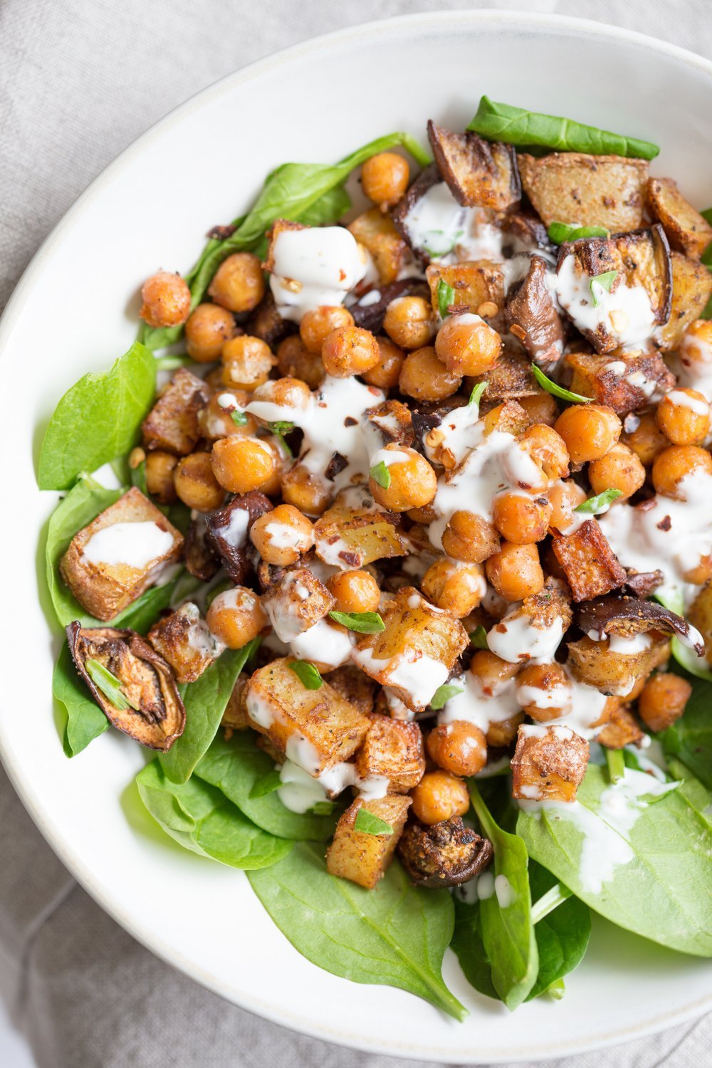 Roasted Eggplant Potatoes Chickpeas with Moroccan Merguez seasoning. Veggies tossed in Merguez blend, roasted then served with tahini dressing. #Vegan #Glutenfree #soyfree #Recipe #veganricha | VeganRicha.com